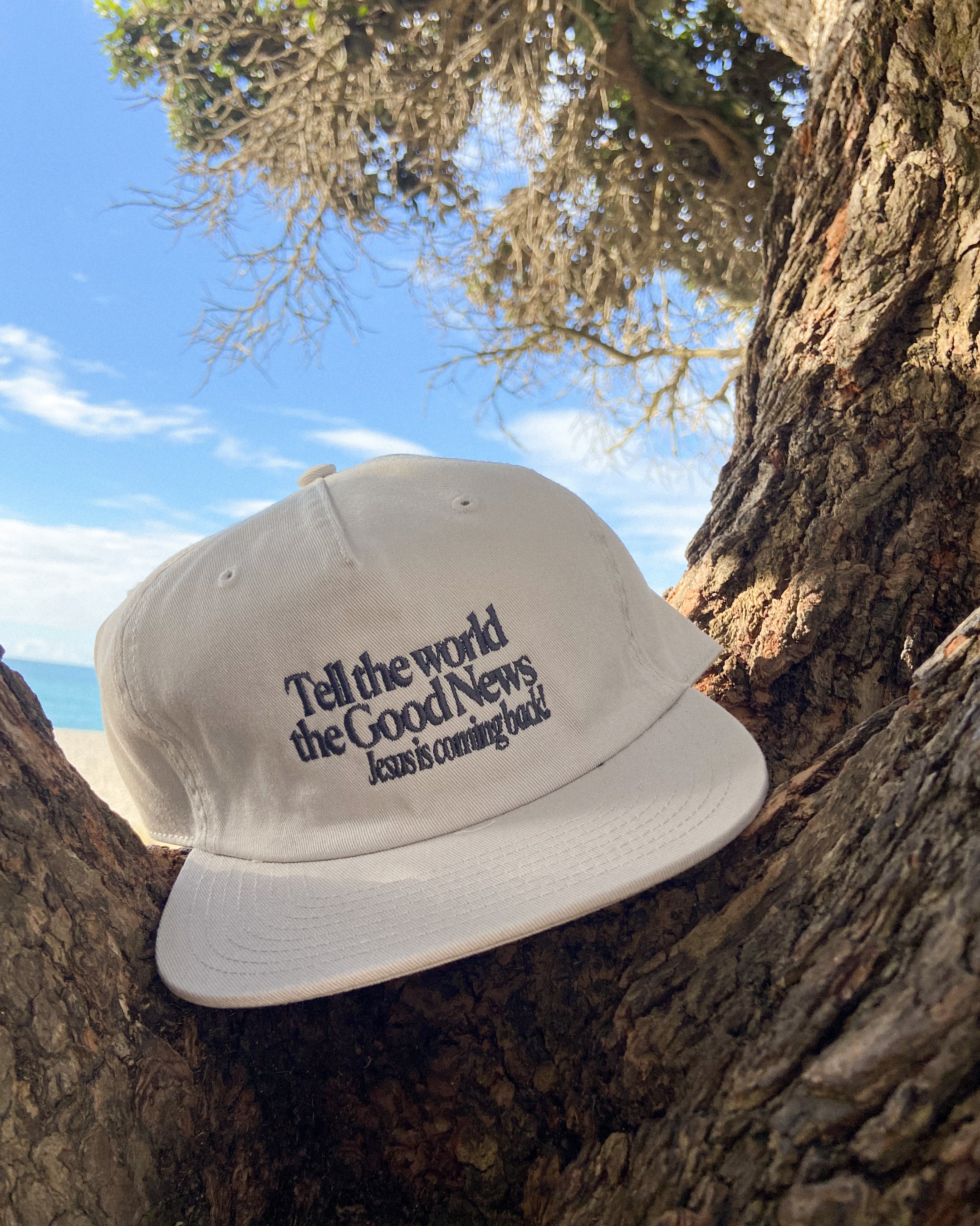 TELL THE WORLD CAP